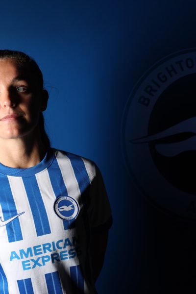 Caitlin Hayes signs for Brighton and Hove Albion at the American Express Elite Football Performance Centre during the 2024/25 season