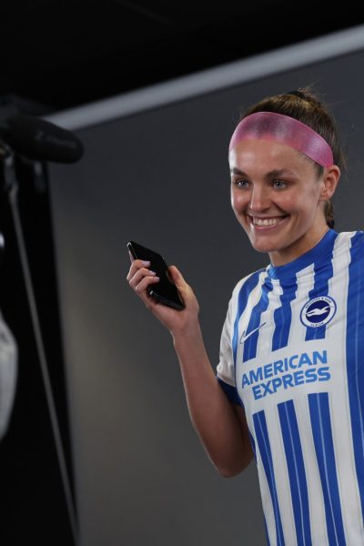 Caitlin Hayes signs for Brighton and Hove Albion at the American Express Elite Football Performance Centre during the 2024/25 season